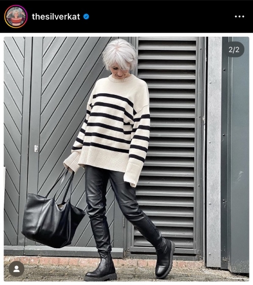 ZARA黑白條紋毛衣搭配富光澤感的H&M人造皮褲，讓穿搭變得有點個性。