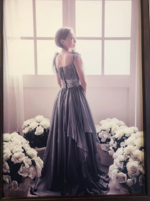 媽媽交待會場要放這張照片，來提醒大家她曾經的優雅。