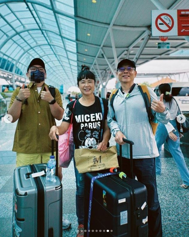 朱先生（左）經常分享柴克瑞與迪娜的故事，沒想到很受網友們歡迎。